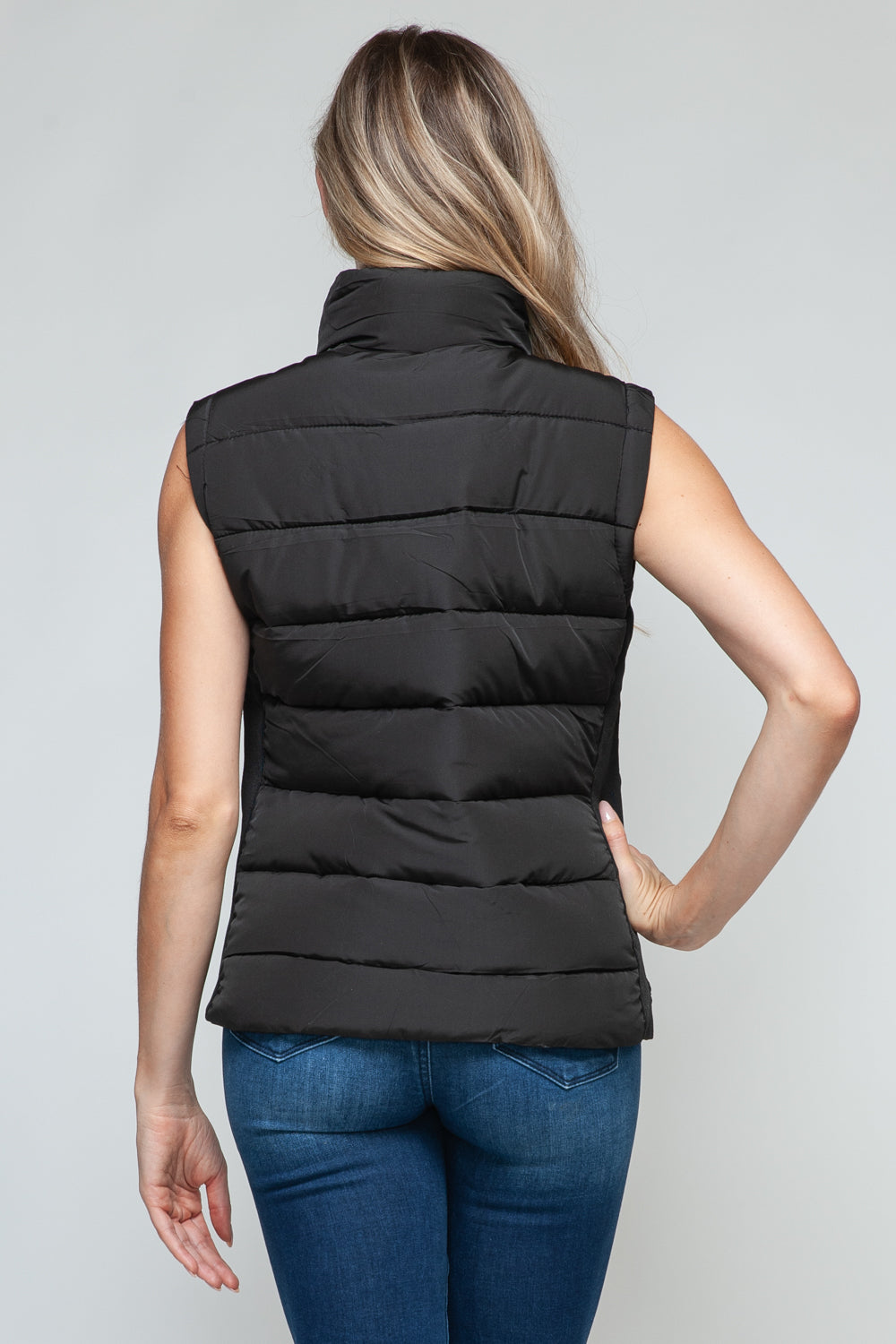 Zip Up Turtleneck Vest with Pockets in Black